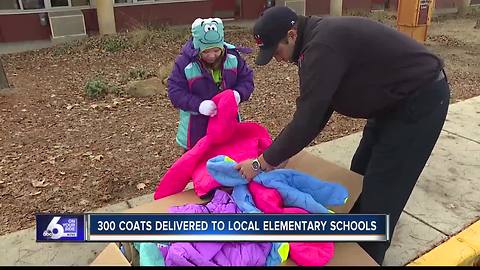 Boise firefighters give coats to kids in need