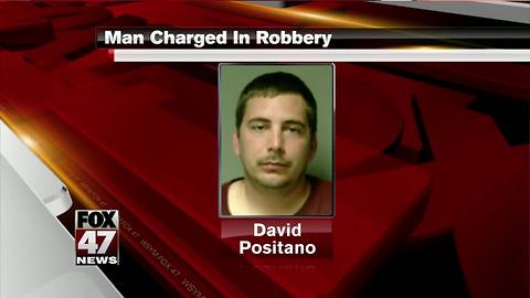 Lansing man charged after unarmed robbery