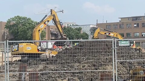 Army of Construction trucks for Upcoming Condos Rue de la Savane