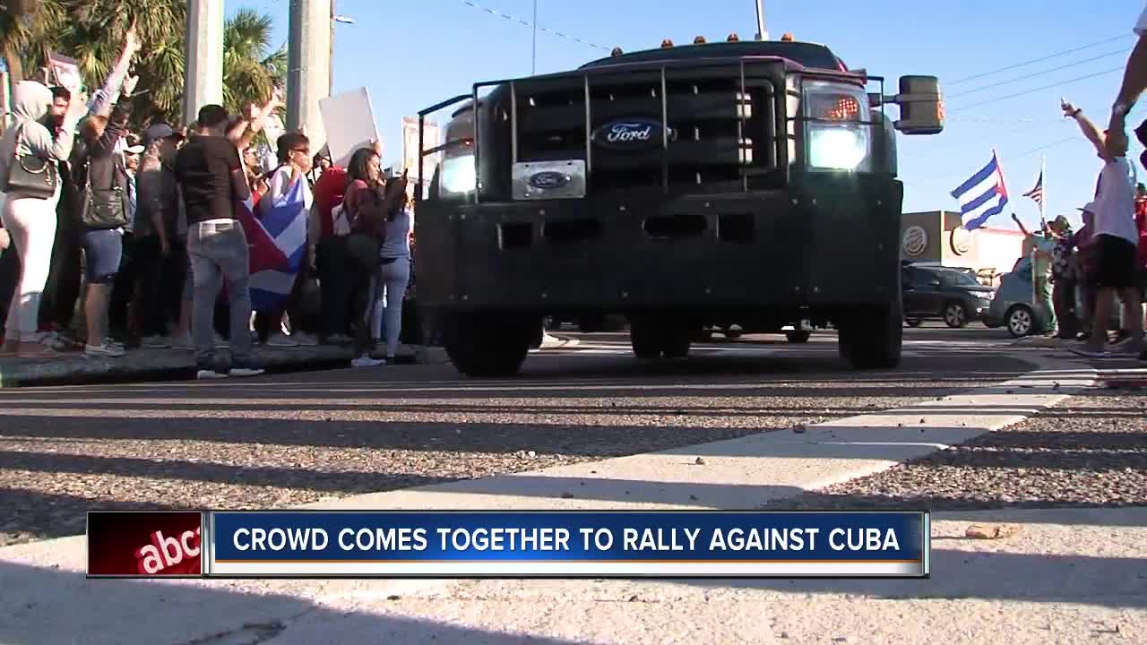 Crowd comes together to rally against Cuba