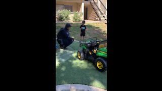 Tempe police officers replace stolen toy gator tractor for young boy