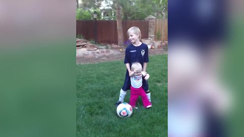 Adorable Tot Girl Learns How To Play Soccer