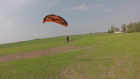 A Paraglider Gets Picked Up By Wind Too Fast