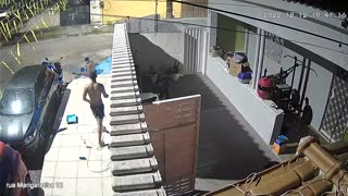 Guy Carrying Bucket Slips and Falls