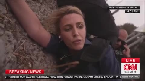 CNN's Clarissa Ward taking cover in a ditch amid near the Israel-Gaza border