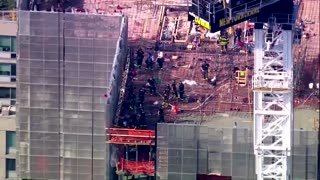 NYC crane snaps, crashes into street