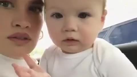 Baby smiles when she finds out her mother is smiling too