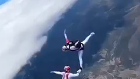 exciting jump with a parachute