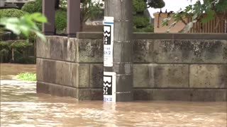 Torrential rains flood streets of northeastern Japan