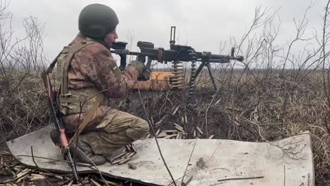 Ukrainian Fighters Fire At Russian Military Positions Using Machine Guns And Recoilless Rifles