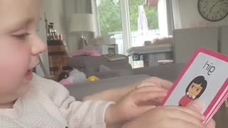 Clever 18 Month Old Cutey Reads Flashcards