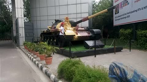 Army tank at the door of lovely university