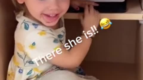 Toddler hides in kitchen cabinet to watch movie