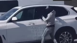 Thieves armed with handguns smash & grab a car to steal someone’s bag in San Francisco