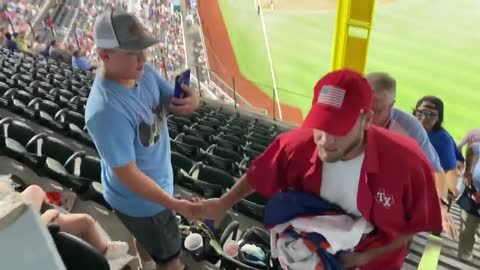 Man Unfurls Massive "Trump Won" Sign at Baseball Game and Shouts "Our Election Was Stolen!"