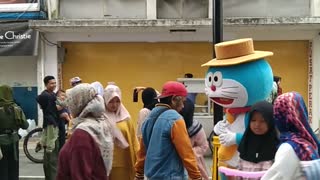 Beautiful umbrella Doraemon clown festival