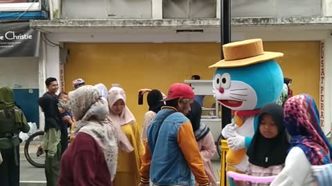 Beautiful umbrella Doraemon clown festival