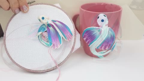 Gift set for an embroiderer. An embroidery magnet and a cup with Sea Furies decor by AnneAlArt