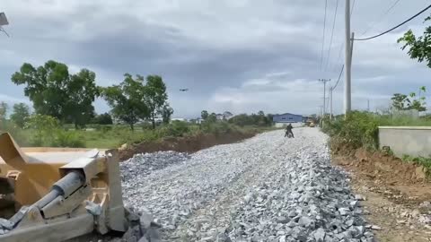 New bulldozer spreading gravel processing features building road foundation-18