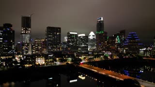 360 aerial view of downtown Austin Texas on a Saturday night.