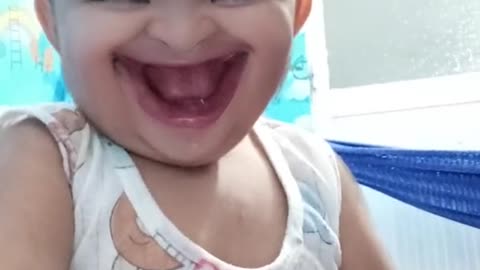 baby laughs his mouth like torn