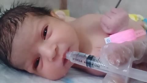 New born baby very beautifull take water through syrings baby is so cute and very nice--‍--❤--