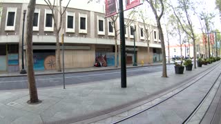 Tarp Shelter on store front, CA homeless woes