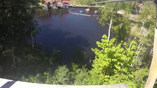 GoPro footage of riding a Zip line across a lake