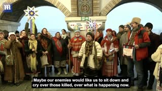 Defiant Ukrainians sing Christmas carols inside a metro station in Kyiv Russia Ukraine war
