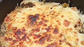 Vegetables gratinated with cheese in the Dutch oven