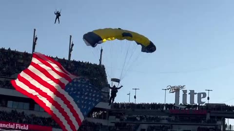 American Flag Landing over stadium