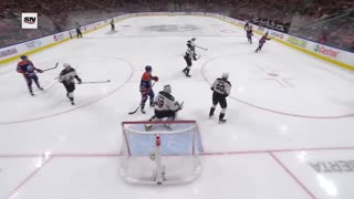 Connor McDavid scores from below the goal line