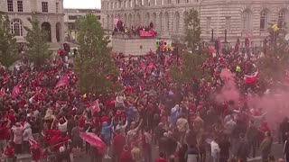 Liverpool parade celebrates domestic cup double win