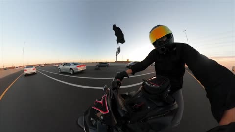 Tire Piece Went Flying at a Motorcyclist and Hit His Full Face Helmet