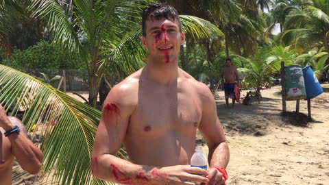 Wave Slams Tourist into Rocks