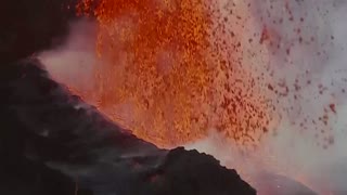 Lava erupts from La Palma volcano as dawn breaks