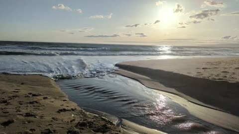 Waves, Creek and Bright Sun