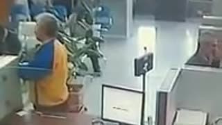 Caught on camera: Man steals cash inside a bank