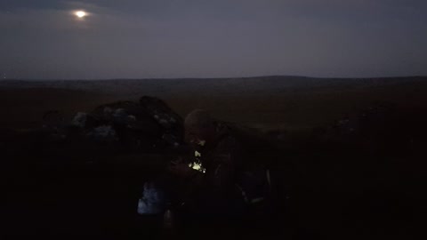 Getting my headtorch ready for a night hike at great links Tor 2022