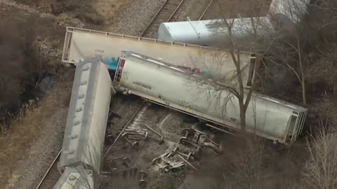 Train carrying hazardous materials derails outside Detroit.