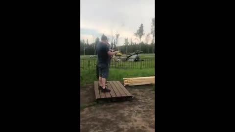 An American shooting an AK in Russia