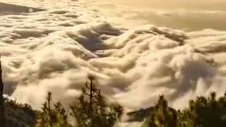 CLOUDS LIKE OCEAN WAVES