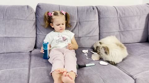 Baby Girl and Her Everyday Makeup Routine With Fluffy Cat