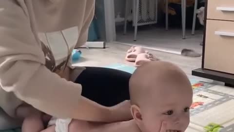 Adorable baby🥰😍 relaxing while taking massage