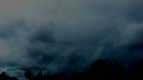 dark sky moving clouds