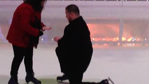 Woman Falls During Proposal on Ice