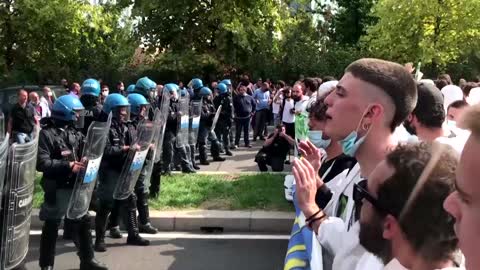 Climate activists clash with police in Milan