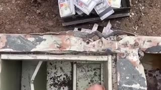 THEY FOUND A STEEL SAFE BURIED UNDER THE GROUND FOR A LONG TIME.