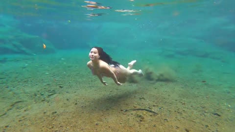 beautiful girl swimming