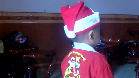 My son dressed in Christmas